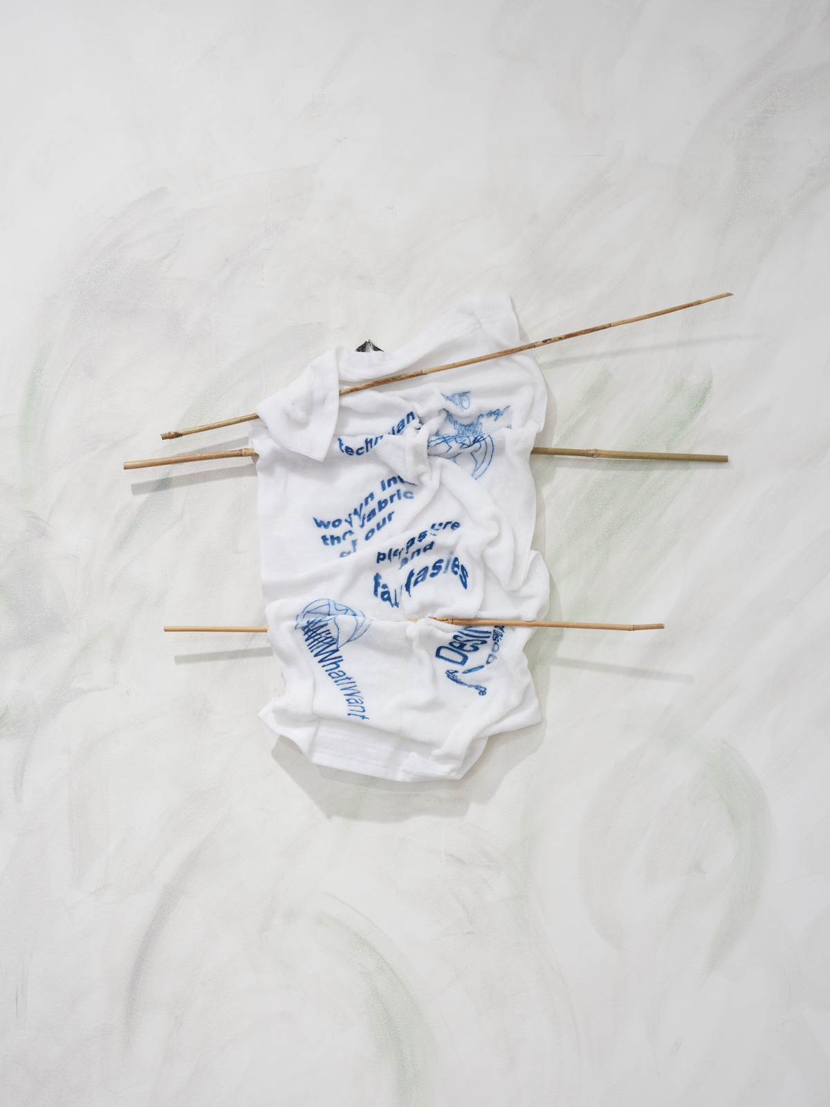 Egle Kulbokaite and Dorota Gaweda, For a Future X (II), 2016, Embroidery, towel, paraffin wax, bamboo sticks, 28 x 35 in, 71 x 90 cm